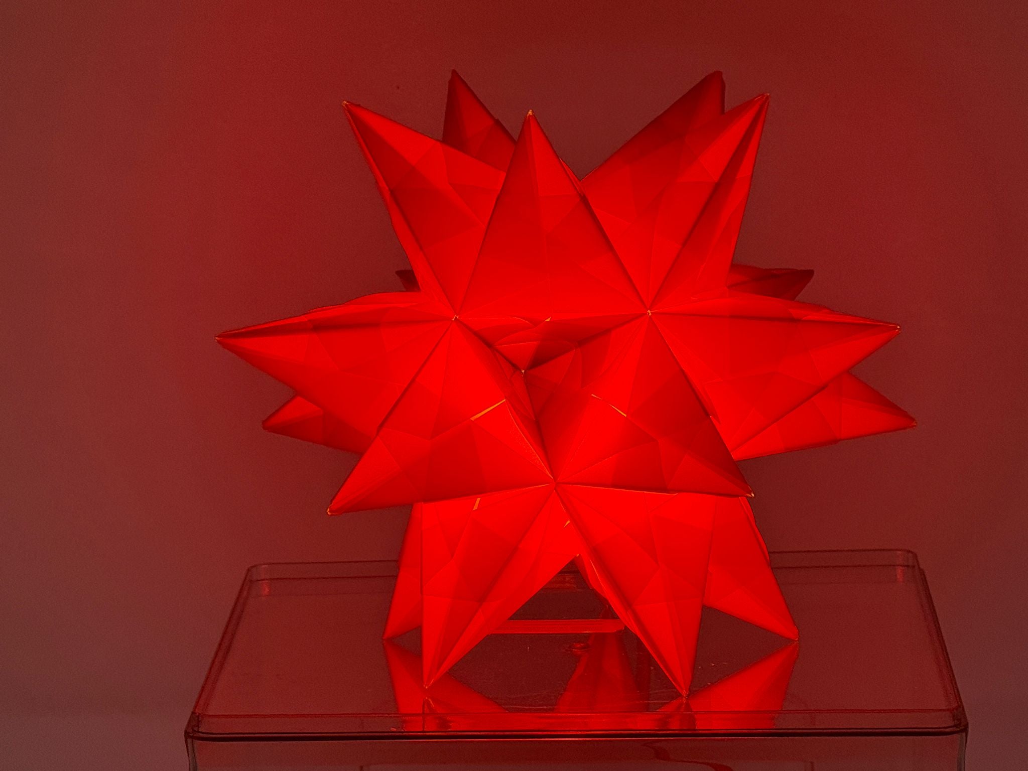 Handgefertigter Bascetta Stern orange, 10cm Durchmesser, Micro LED batteriebetrieben